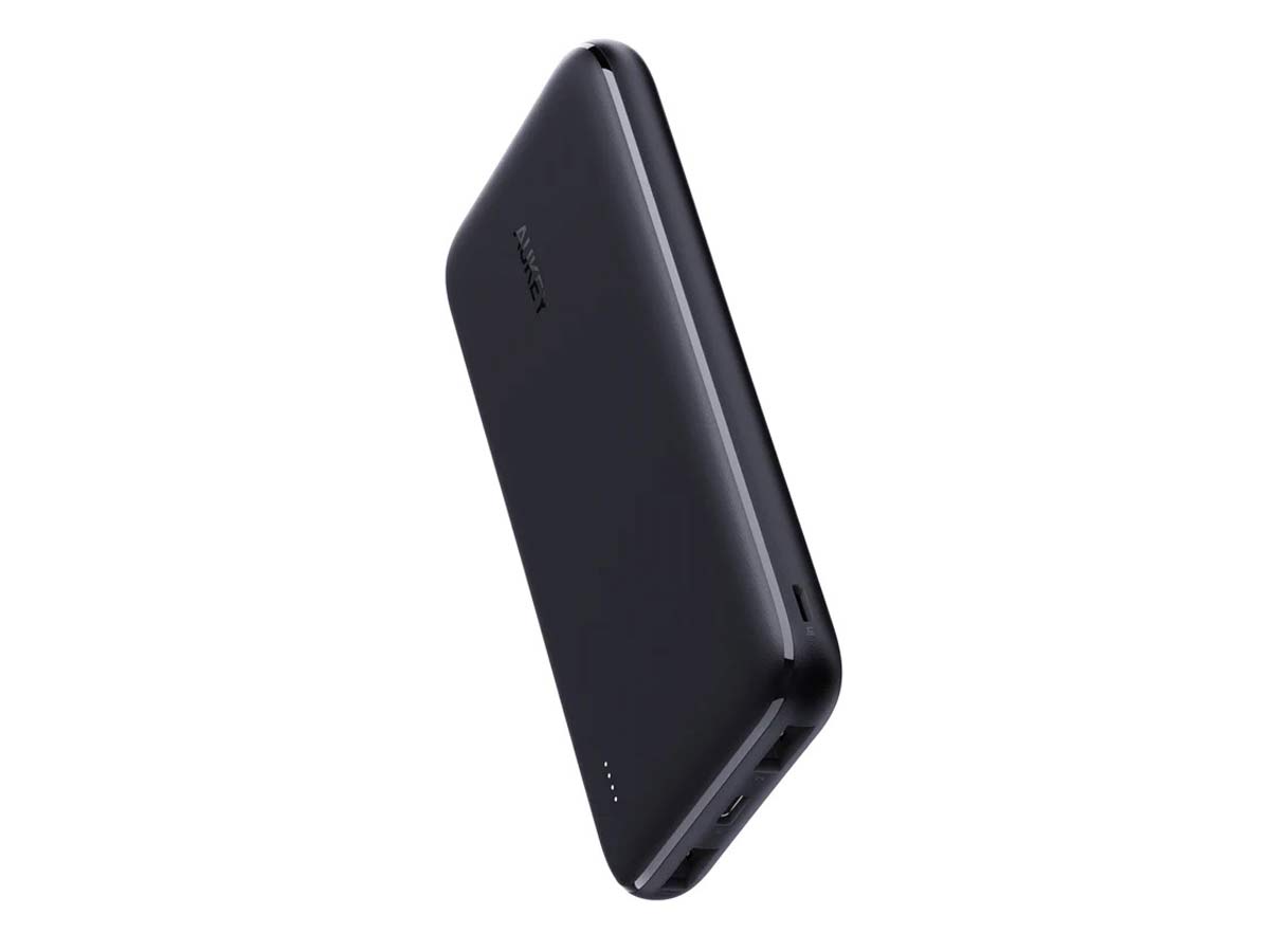 Slim black Aukey power bank with rounded edges and minimal design.